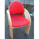 A LARGE QUANTITY OF RED UPHOLSTERED STACKING CHAIRS A/F (APPROX 40 )