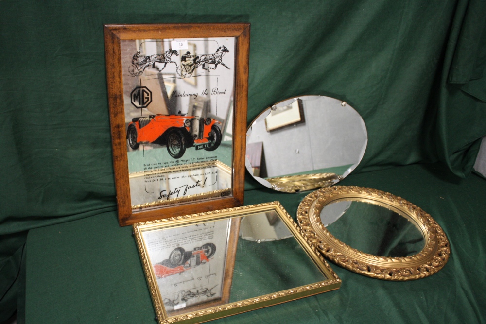 FOUR ASSORTED WALL MIRRORS TO INCLUDE AN MG ADVERTISING EXAMPLE, GILT FRAMED CIRCULAR MIRROR ETC.