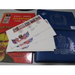 TWO 1977 QUEENS SILVER JUBILEE STAMP ALBUMS AND CONTENTS TOGETHER WITH A STANLEY GIBBONS WORLD STAMP