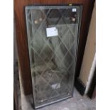 A PAIR OF LEADED WINDOWS 91 CM X 48 CM TOGETHER WITH A SMALLER LEADED WINDOW 83 CM X 43 CM