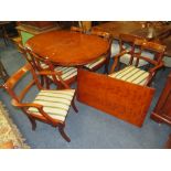 A MODERN YEW WOOD TWIN PEDESTAL DINING TABLE WITH ONE EXTRA LEAF AND SIX CHAIRS ( 4 + 2 )