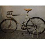 A PERRETTS CYCLE BICYCLE A/F ON VINTAGE TRAINING STAND