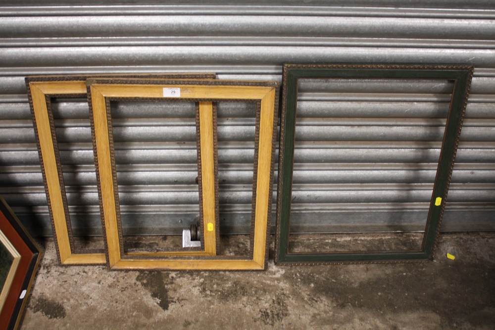 A PAIR OF VINTAGE PICTURE FRAMES REBATE 35.5CM X 45.5CM TOGETHER WITH A GREEN PAINTED EXAMPLE REBATE