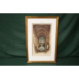 A FRAMED AND GLAZED COLOURED ETCHING OF EXETER CATHEDRAL BY EDWARD SHARLAND SIGNED IN PENCIL LOWER