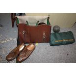 A LEATHER BAG OF HENSELITE LAWN BOWLS WITH SHOES AND A BAG OF GARDEN BOULES