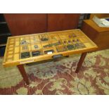 A PRINTERS DISPLAY TABLE, MODELLED WITH A TRAY TOP AND ASSORTED SAMPLES, TOOLS ETC H-46 W-82 CM
