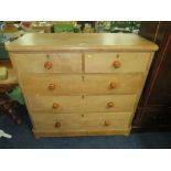 AN ANTIQUE PINE CHEST OF TWO SHORT ABOVE THREE LONGER DRAWERS H-114 W-119 CM