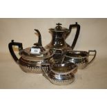 A FOUR PIECE SILVER PLATED TEA SET