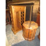 A COLONIAL STYLE HARDWOOD BOUND LIDDED OCTAGONAL BOX H-45 CM AND A PINE WINE RACK (2)