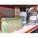 THREE METAL BREAD BINS PLUS ANOTHER TIN