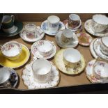 A TRAY OF ANTIQUE AND LATER CUPS AND SAUCERS TO INCLUDE ADDERLEY, COALPORT AND LIMOGES EXAMPLES