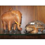 TWO ORIENTAL HAND WOVEN LIDDED BOXES, IN THE FORM OF A TORTOISE AND AN ELEPHANT
