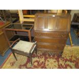 AN OAK BUREAU W-76 CM WITH A PIANO STOOL AND TROLLEY