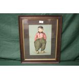 A VINTAGE FRAMED AND GLAZED PRINT OF A DUTCH BOY, 21.5 X 31 CM