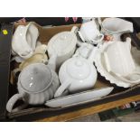 A TRAY OF MOSTLY PLAIN WHITE TEAPOTS TOGETHER WITH A TRAY OF GLASSWARE AND A SMALL TRAY OF METALWARE