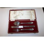 A CASED HALLMARKED SILVER CHRISTENING SET