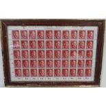 A SHEET OF 50 WW2 DEUTCHES REICH STAMPS SHOWING THE PROFILE OF ADOLF HITLER SET IN A PERIOD GLAZED
