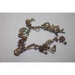 A VINTAGE SILVER CHARM BRACELET, APPROX WEIGHT 28.8 G