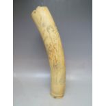 A LATE 19TH / EARLY 20TH CENTURY BENIN IVORY TUSK VASE, decorated with typical tribal figures and