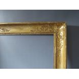 AN 18TH CENTURY FRENCH DECORATIVE GOLD FRAME WITH INTEGRAL SLIP, frame W 8 cm, frame rebate 66 x