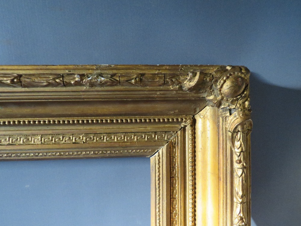 A 19TH CENTURY GOLD FRAME WITH ACANTHUS LEAF DESIGN TO OUTER EDGE, frame W 10 cm, frame rebate 85.