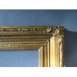 A 19TH CENTURY GOLD FRAME WITH ACANTHUS LEAF DESIGN TO OUTER EDGE, frame W 10 cm, frame rebate 85.