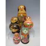 A COLLECTION OF FIVE RUSSIAN DOLLS, of varying heights and forms, tallest H 21 cm