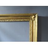 AN 18TH CENTURY GOLD FRAME WITH SHELL EMBELLISHMENTS TO INNER CORNERS, frame W 7 cm, frame rebate