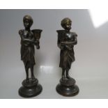 A PAIR OF 20TH CENTURY BRONZED METAL MALE AND FEMALE FIGURATIVE CANDLE HOLDERS, H 25 cm