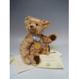 A STEIFF YEAR BEAR 'THE 2002 BEAR' 654756, button in ear with yellow tag, serial no 4981, with