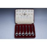 A CASED SET OF SIX HALLMARKED SILVER 'BRITISH HALLMARKS' TEASPOONS, each with a different assay