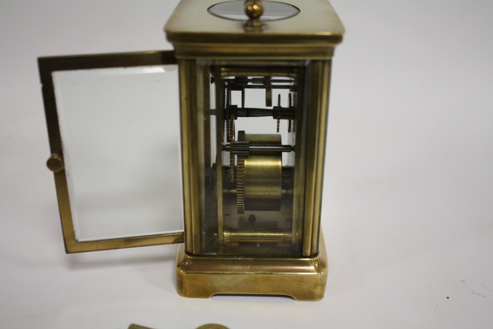 A SMALL BRASS CASED DUVERDREY & BLOQUEL CARRIAGE CLOCK, the enamel dial with Roman numerals, the - Image 4 of 5