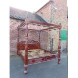 A LATE 20TH CENTURY CARVED MAHOGANY SUPER KING SIZE FOUR POSTER BED, approx W 200 cm, H 234 cm, L