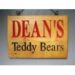 A WOODEN DEAN'S TEDDY BEARS ADVERTISING SIGN, W 41.5 cm, H 29.5 cm, D 2.3 cm