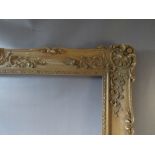 A 19TH CENTURY GOLD SWEPT FRAME, frame W 13 cm, rebate 105 x 76 cm