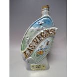 A VINTAGE SEALED CERAMIC 'LAS VEGAS' DECANTER OF BEAM 100 MONTHS OLD KENTUCKY STRAIGHT BOURBON