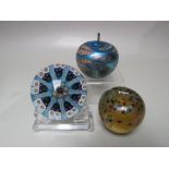 A STRATHEARN MILLEFIORI AND LATTICINO NINE CANE GLASS PAPERWEIGHT, original label to base, Dia. 7.