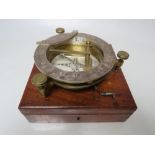 A GEORGIAN 4 1/2" EQUINOCTIAL UNIVERSAL COMPASS BY DOLLOND OF LONDON WITH FITTED CASE AND KEY, on