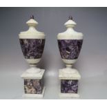 A PAIR OF AMETHYST AND MARBLE MANTEL URNS, H 39 cm Condition Report:both look to have restoration to