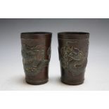 A PAIR OF CHINESE DRAGON BRONZE BEAKERS, H 9 cm