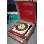 A VINTAGE PORTABLE RECORD PLAYER