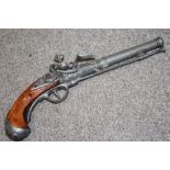 A REPRODUCTION FLINT LOCK PISTOL