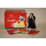 A BOXED ROYAL DOULTON DISNEY SHOWCASE COLLECTION SNOW WHITE AND THE SEVEN DWARFS EVIL QUEEN 'TAKE