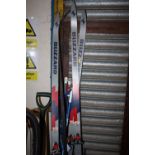 TWO PAIRS OF BLIZZARD SKIS PLUS SKI POLES