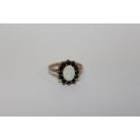 A HALLMARKED 9 CARAT GOLD OPAL SET DRESS RING APPROX WEIGHT - 2.5G