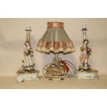 A PAIR OF CAPE DI MONTE FIGURATIVE TABLE LAMPS TOGETHER WITH A GERMAN EXAMPLE (3)