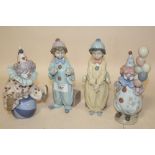 FOUR LLADRO FIGURES OF CHILDREN AND CLOWNS S/D