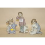 THREE NAO FIGURES OF CHILDREN WITH SOFT TOYS