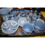 A TRAY OF BLUE WEDGWOOD JASPERWARE TO INCLUDE VASES, CABINET PLATES ETC.