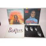 TWO SIGNED EMILE FORD LP RECORDS, TOGETHER WITH TWO THE BEATLES LP RECORDS TO INCLUDE WITH THE